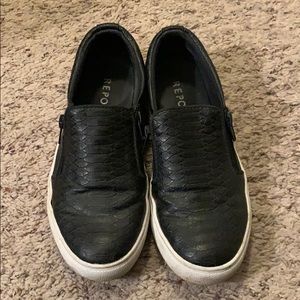 Black slides with side zippers